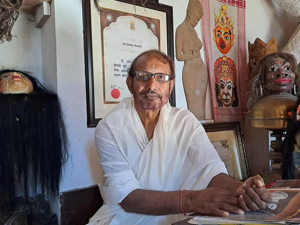 Hem Chandra Goswami with his masks at his home in Majuli