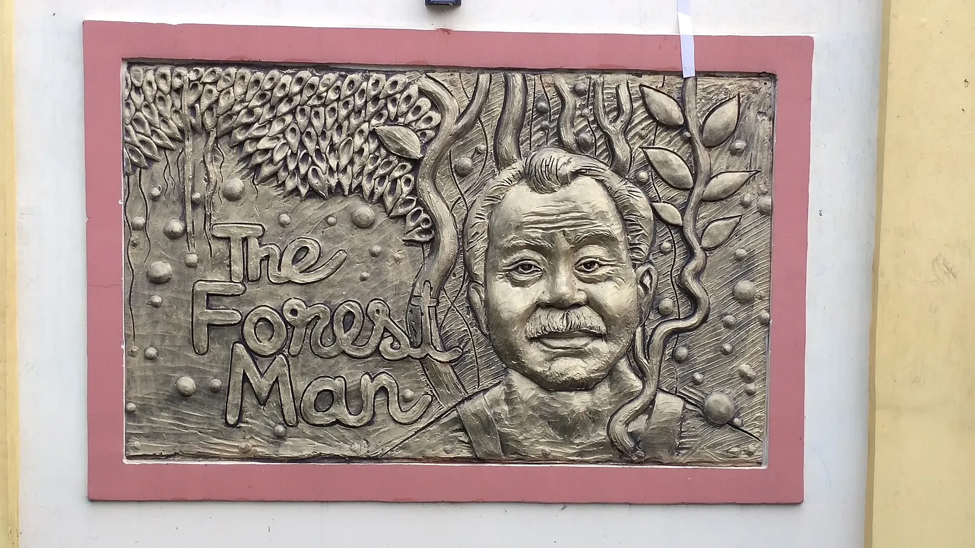 A relief sculpture of Jadav Payeng titled The Forest Man