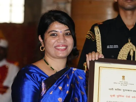 Purnima Devi Barman receiving the Nari Shakti Puraskar in 2018